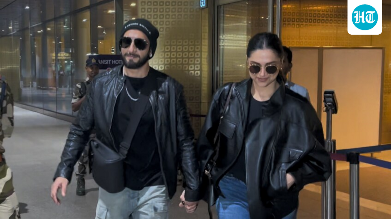 Proud Deepika Padukone cannot resist a smile as paparazzi...